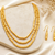 Gold-toned 3-layer beaded necklace and earrings jewellery set cylindrical beads.