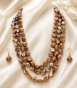 Brown baroque freshwater pearl 3-layer necklace and earring set keshi pearl beads, gold-tone hook earrings.