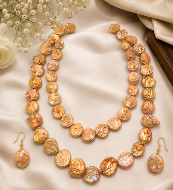 Freshwater coin pearl necklace set with earrings, peach gold double strand, baroque texture, iridescent lustre. 1