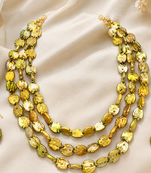 Multi-strand beaded necklace and earring set, gold-green  3-layer necklace, matching earrings.