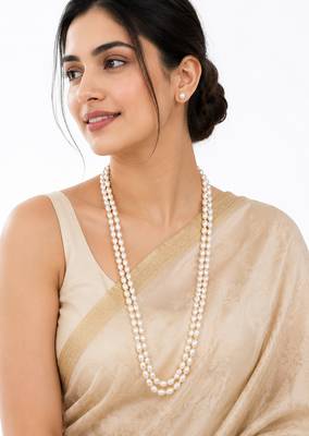 Double strand oval pearl necklace and earrings set, white long mala style, silver-tone clasp, stud earrings included. 1
