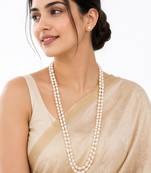 Double strand oval pearl necklace and earrings set, white long mala style, silver-tone clasp, stud earrings included.