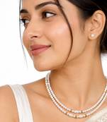 Double strand pearl necklace set with stud earrings, white gold-tone accents, oval & round pearls.