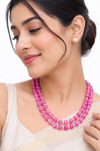 Pink jade beaded double strand necklace with pearl stud earrings faceted jade beads, white pearl accents.