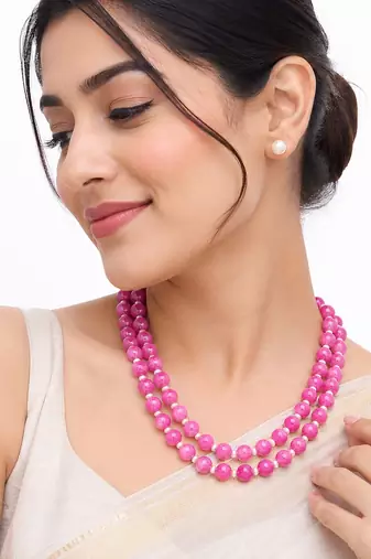 Pink jade beaded double strand necklace with pearl stud earrings faceted jade beads, white pearl accents.