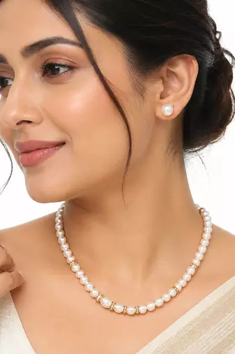 Pearl necklace and earring set with gold-tone crystal rings stud earrings included, crystal rondelle accents.