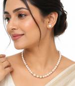 Pearl necklace and earring set with gold-tone crystal rings stud earrings included, crystal rondelle accents.