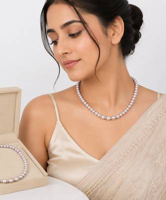 Pearl strand necklace with crystal rondelle spacers, lavender magnetic clasp, graduated pearls. 1