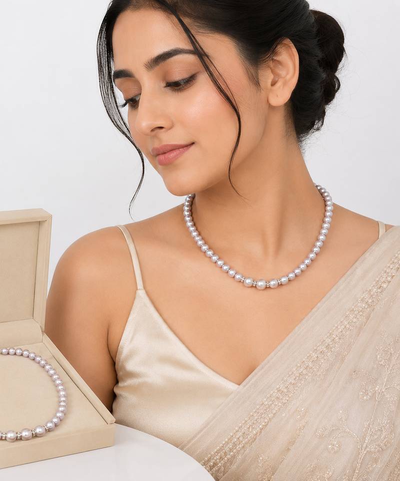 Pearl strand necklace with crystal rondelle spacers, lavender magnetic clasp, graduated pearls.