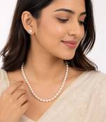 White oval pearl necklace and stud earrings jewellery set rice-shaped pearls, stud earrings included.