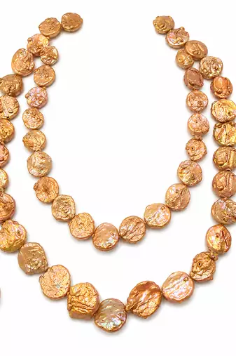 Freshwater coin pearl necklace set with earrings, peach gold double strand, baroque texture, iridescent lustre.