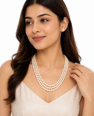 3-layer pearl necklace and earring set, white stud earrings included, gold-tone clasp, layered design. 1