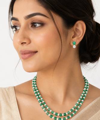 Double strand green beads and pearl necklace set with earrings. 1