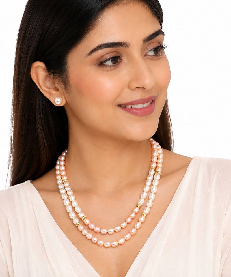 Double strand pearl necklace set with stud earrings, pink & white gold-tone spacers, oval pearl beads.