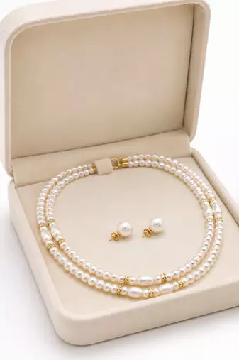 Double strand pearl necklace set with stud earrings, white gold-tone accents, oval & round pearls.