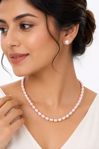 Freshwater pearl necklace and stud earrings set, pink rice-shaped pearls, stud earrings included, graduated design.