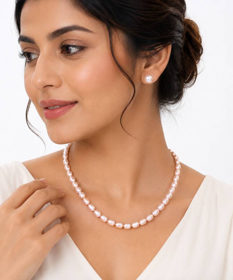 Freshwater pearl necklace and stud earrings set, pink rice-shaped pearls, stud earrings included, graduated design.
