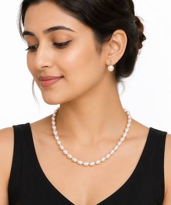 Freshwater pearl necklace and earrings set, white oval beads graduated design, drop earrings included, gold-tone clasp. 1