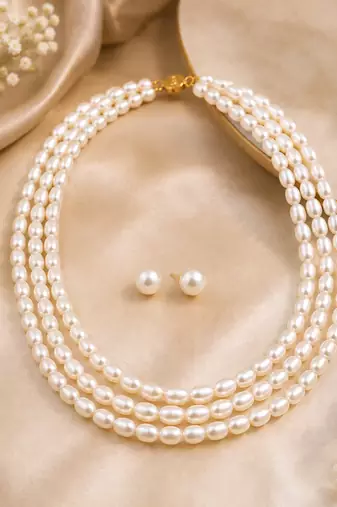 3-layer pearl necklace and earring set, white stud earrings included, gold-tone clasp, layered design.