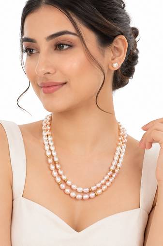 Freshwater pearl double strand necklace and earrings set pink & white pearls, gold-tone spacers. rice pearls.