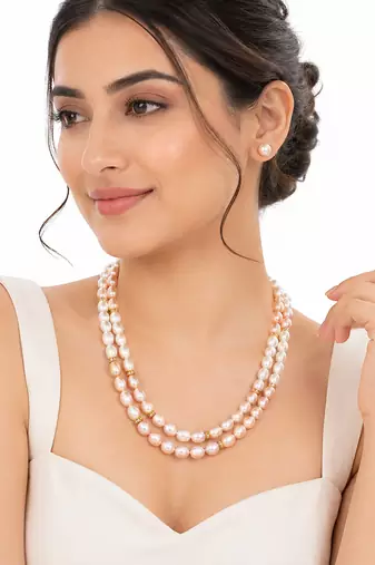 Freshwater pearl double strand necklace and earrings set pink & white pearls, gold-tone spacers. rice pearls.