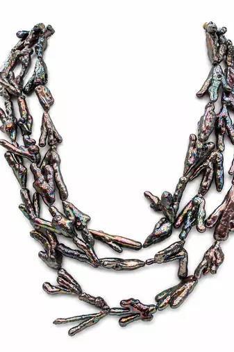 Baroque pearl necklace and earring set, dark iridescent multi-strand necklace, cactus-shaped earrings.