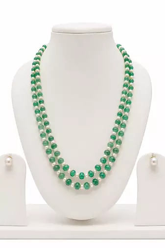 Double strand green beads and pearl necklace set with earrings.