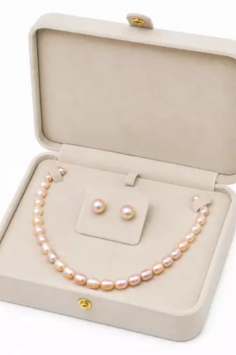 Freshwater pearl necklace and stud earrings set, pink rice-shaped pearls, stud earrings included, graduated design.