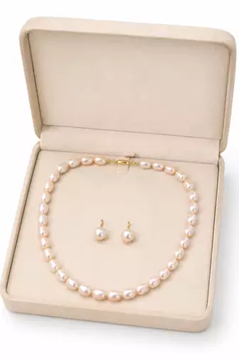 Freshwater pearl necklace and earrings set, white oval beads graduated design, drop earrings included, gold-tone clasp.