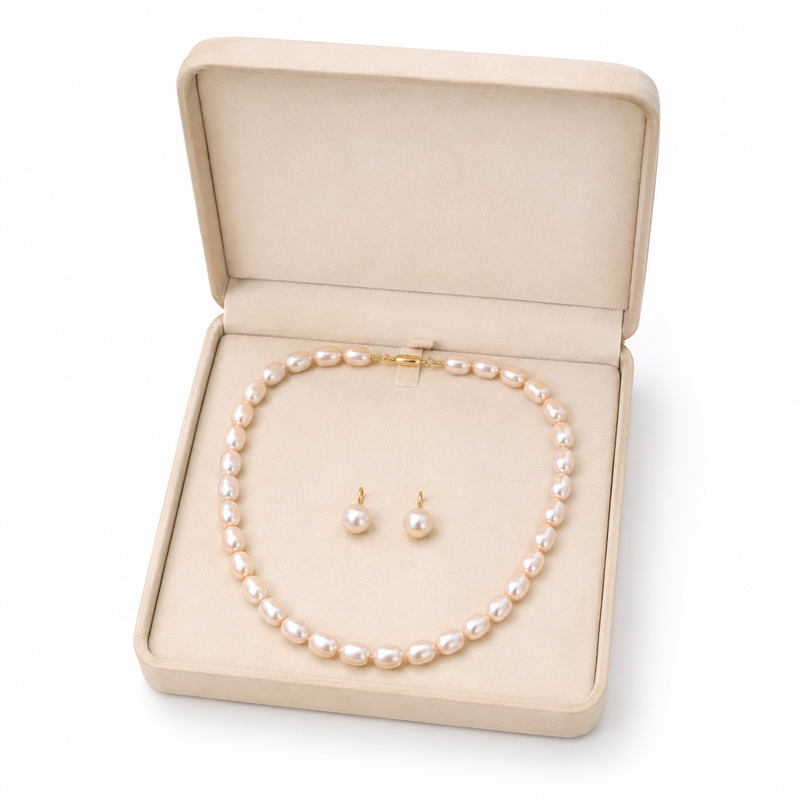 Freshwater pearl necklace and earrings set, white oval beads graduated design, drop earrings included, gold-tone clasp.
