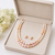 Freshwater pearl double strand necklace and earrings set pink & white pearls, gold-tone spacers. rice pearls.
