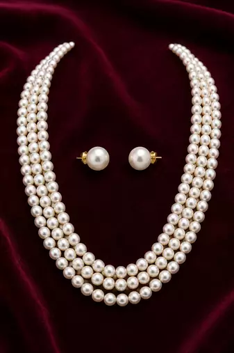 3-layer pearl necklace and earring set, white stud earrings included, gold-tone clasp, layered design.