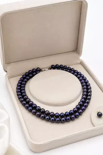 Black pearl double strand necklace and stud earrings set double strand design, stud earrings included.