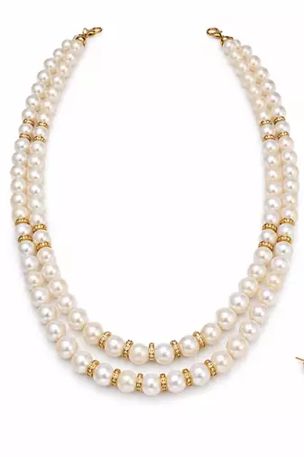 Double strand pearl necklace set with gold rondelle spacers includes stud earrings, layered design.