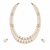 Double strand pearl necklace set with gold rondelle spacers includes stud earrings, layered design.