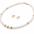 Pearl necklace and earring set with gold-tone crystal rings stud earrings included, crystal rondelle accents.