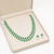 Double strand green beads and pearl necklace set with earrings.