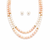 Double strand pearl necklace set with stud earrings, pink & white gold-tone spacers, oval pearl beads.