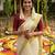 Light chiku linen cotton kerala saree with embroidered blouse