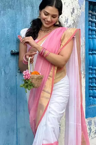 White peach linen cotton kerala kasavu saree with gold zari
