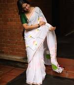 White floral linen cotton saree with green blouse