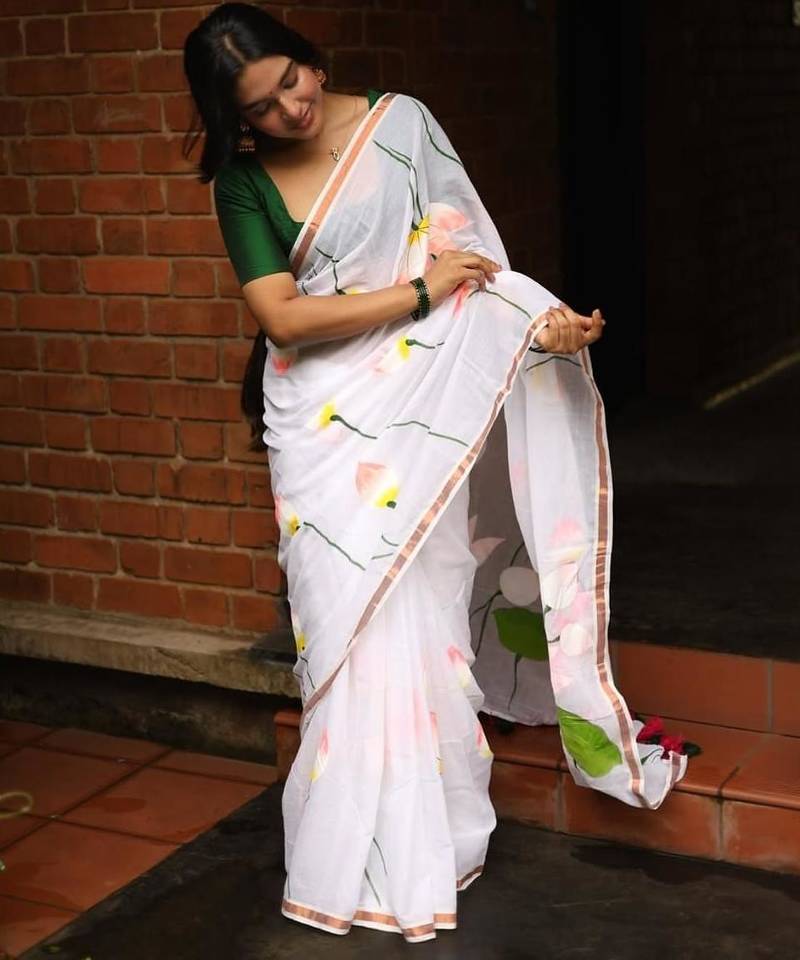 White floral linen cotton saree with green blouse