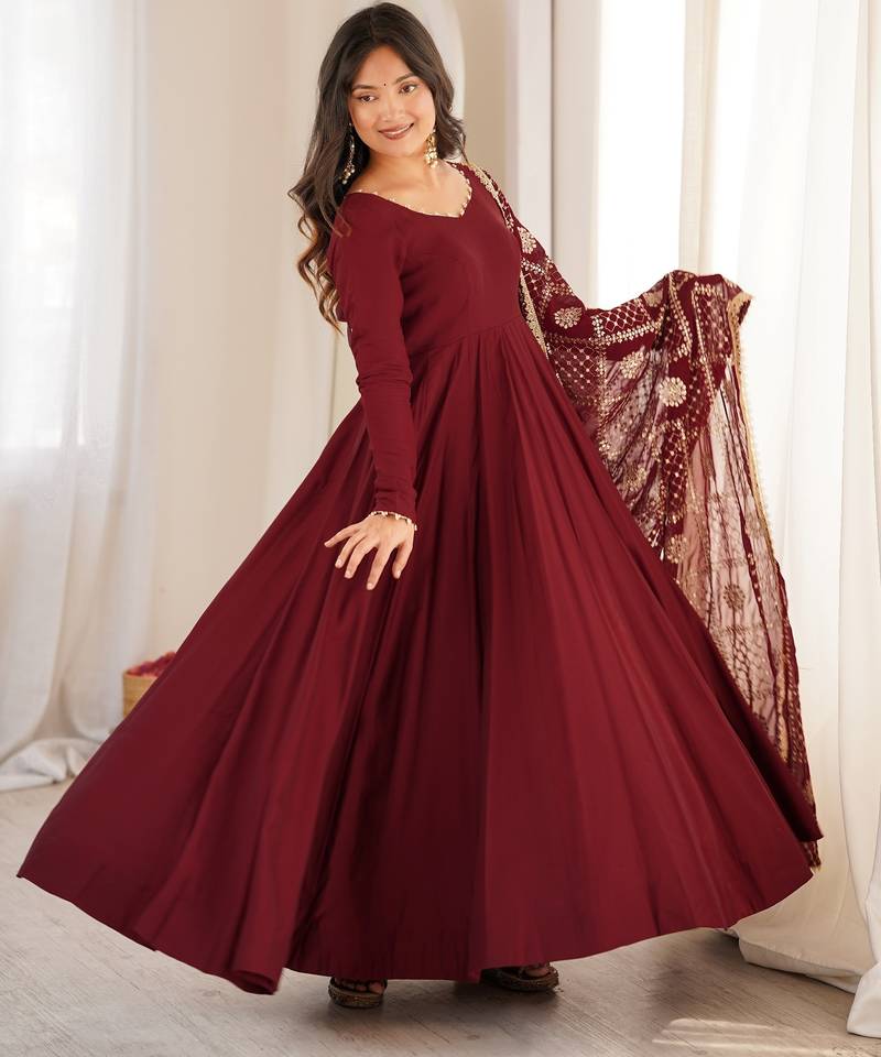 premium roman silk embroidery sequence and jari work maroon readymade ethnic gown 
