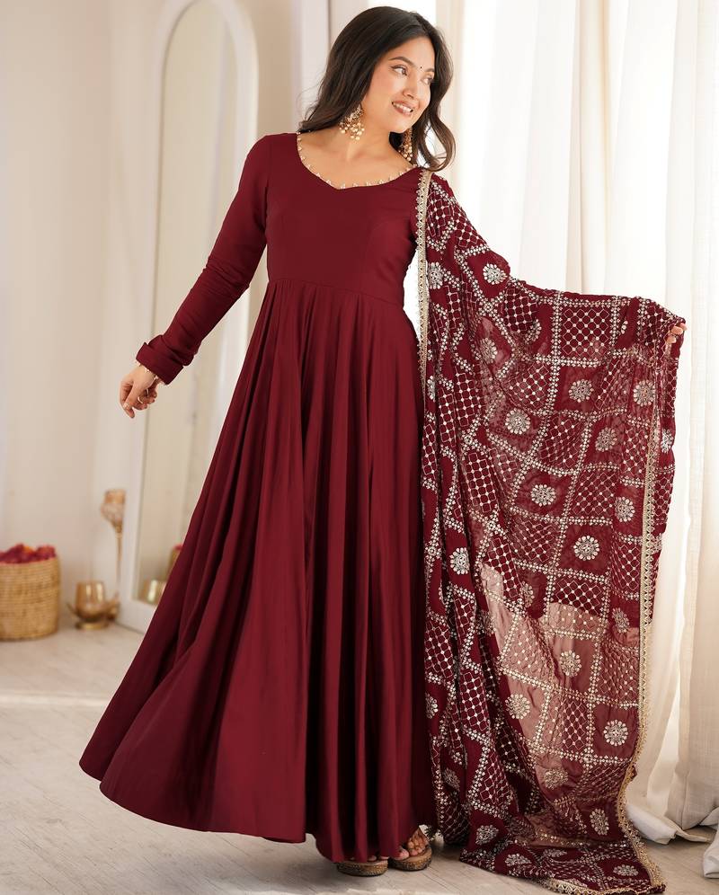 premium roman silk embroidery sequence and jari work maroon readymade ethnic gown 
