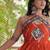 Rust faux georgette leheriya print with kutchi patche work navratri gown