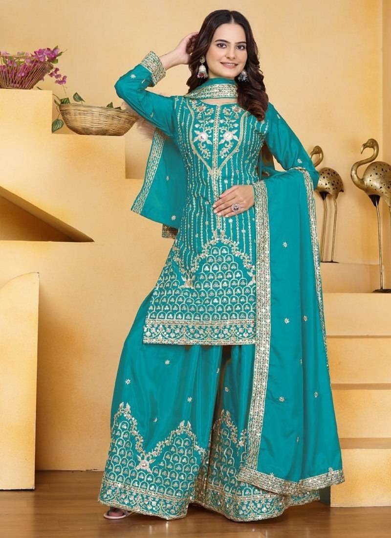 Teal sequins embroidered natural crepe stitched salwar kameez