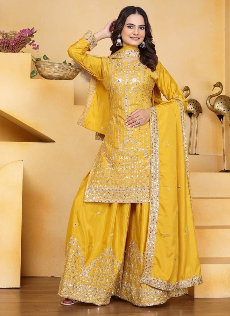 Yellow sequins embroidered natural crepe stitched salwar kameez