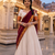 Traditional South Indian Off-White Pleated Lehenga Choli Set with Maroon Dupatta and Zari Border