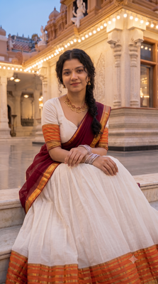 Traditional South Indian Off-White Pleated Lehenga Choli Set with Maroon Dupatta and Zari Border 4