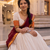 Traditional South Indian Off-White Pleated Lehenga Choli Set with Maroon Dupatta and Zari Border
